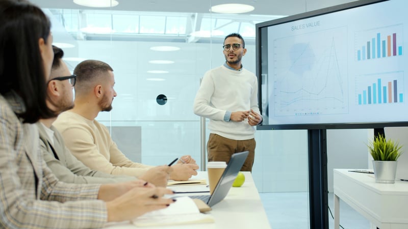 Man explaining data in meeting